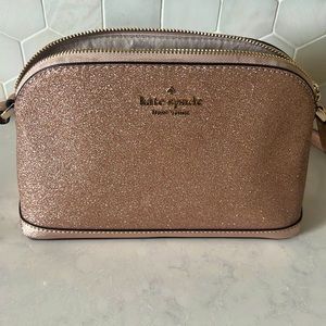 Lightly used Kate spade pink sparkles purse.